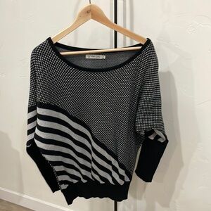 - Black and white sweater